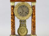a clock that is sitting on top of a table