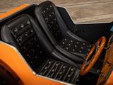 a close up of a car with a steering and a steering wheel