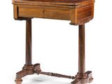 an old wooden table with a drawer on top of it
