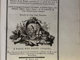 un vieux livre avec une image en noir et blanc représentant un homme à cheval