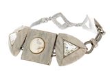 silver bracelet with a picture of a man and a woman on it