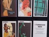 six livres différents exposés sur une table noire