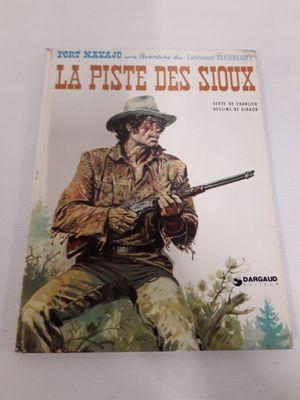 la couverture du livre *La fiste des Sioux*, sur laquelle figure un cow-boy tenant un pistolet