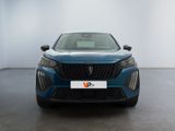 the front view of a blue car in a white room