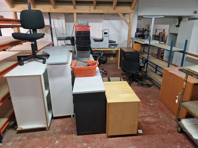 a room that has a lot of furniture in it