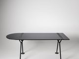 a black table with a black top on a white background