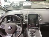 the interior of a car with a steering wheel and dashboard