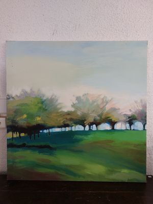 a painting of a green field with trees in the background
