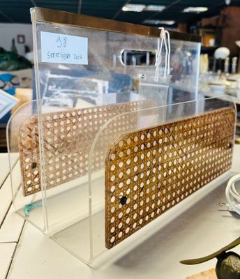 a display case with a basket on top of it