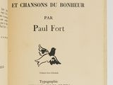 an open book with a picture of a bird flying in the air