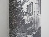 an open book with a drawing of a woman sitting on a bench