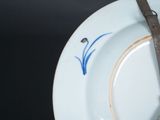 a plate with a knife and fork on it
