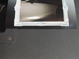 a picture of a computer mouse sitting in a box