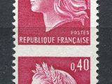 a close up of a stamp with a woman ' s head on it
