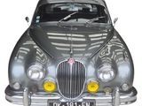 an image of a silver car is shown on a white background