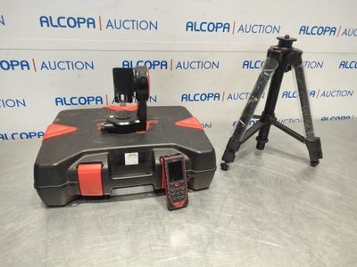 a close up of a camera and tripod on a table