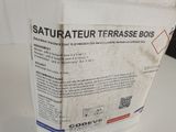 a white container with a label on it sitting on a table