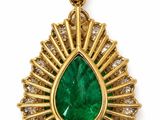 an emerald and diamond pendant