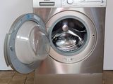 an image of a washing machine with a door open