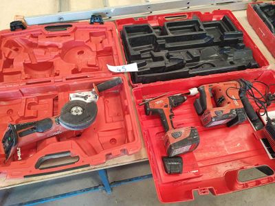 many tools in a red case on a table