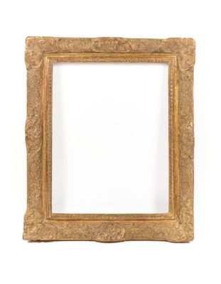 an old gold frame with a white background