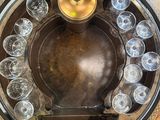 an image of a gold plate with a clock on it