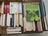 a box full of books sitting on the floor