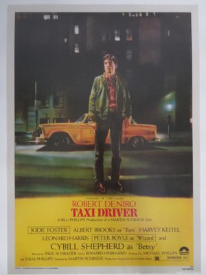 the taxi driver movie poster with a man standing in front of a taxi