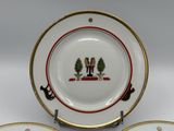 two plates with a picture of a man and a woman on them