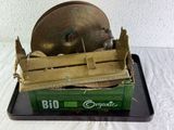 a box with a drum on top of it on a table