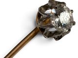 an image of a stick with a diamond on it