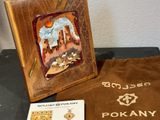 une photo représentant un cadre en bois contenant une photo