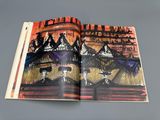 an open book with a picture of a circus on it
