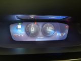 a digital display in the center of a car