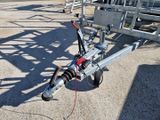 a small boat trailer with a trailer attached to it