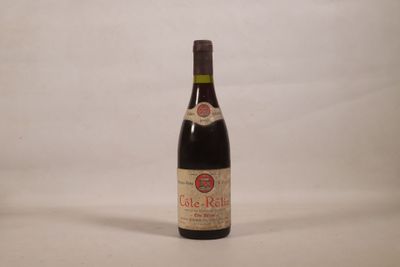 a bottle of wine that is sitting on a table