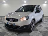the white nissan qx - v is parked in the garage