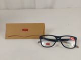 glasses are sitting on a table next to a box of glasses