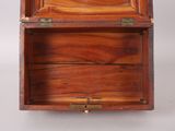 an old wooden box with a metal latch on the top
