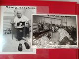 an old photo of a man sitting on a chair