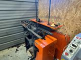 a machine that is sitting next to a wall