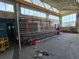 an image of a large warehouse with a lot of metal pipes