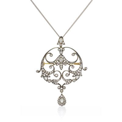 an antique diamond and gold pendant necklace