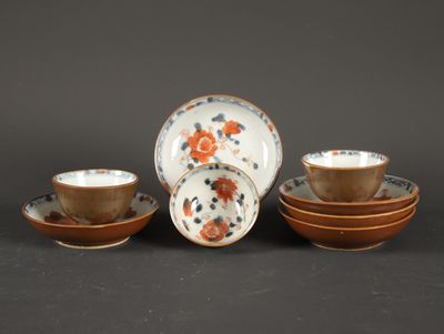four pieces of chinese tea set with orange and blue flowers