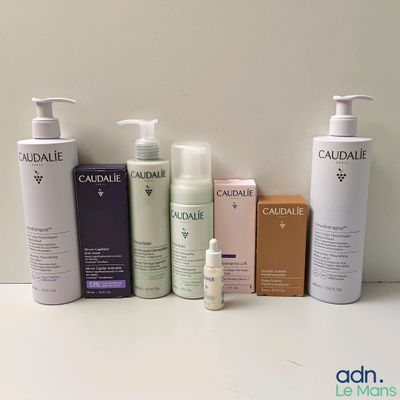 many different types of skin care products sitting on a table