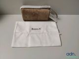the bag is sitting on the table next to the bag