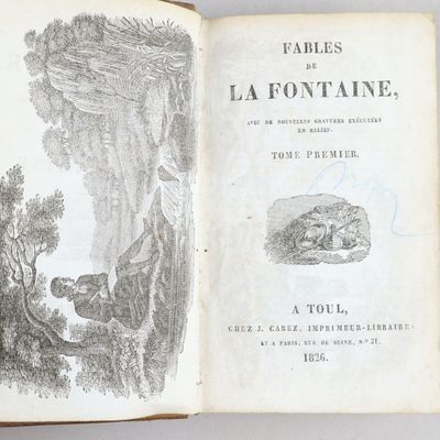 an open book with a picture of a man and a dog on it