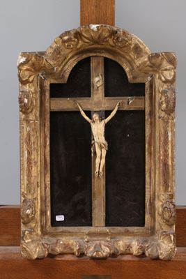 a wooden cross with a crucifix on it