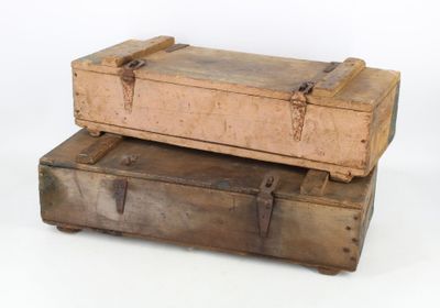 two old suitcases stacked on top of each other