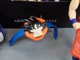 figurines of dragon ball characters on display at a toy store